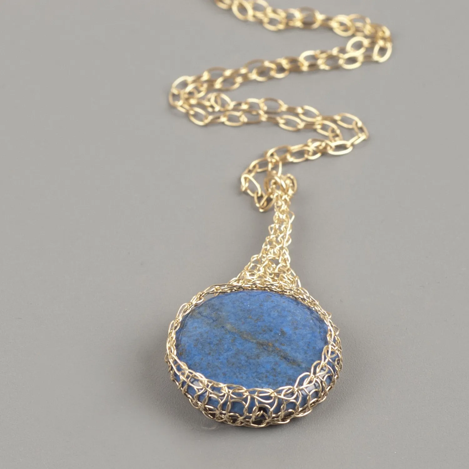 Blue Lapis lazuli pendant necklace wire crocheted in gold wire