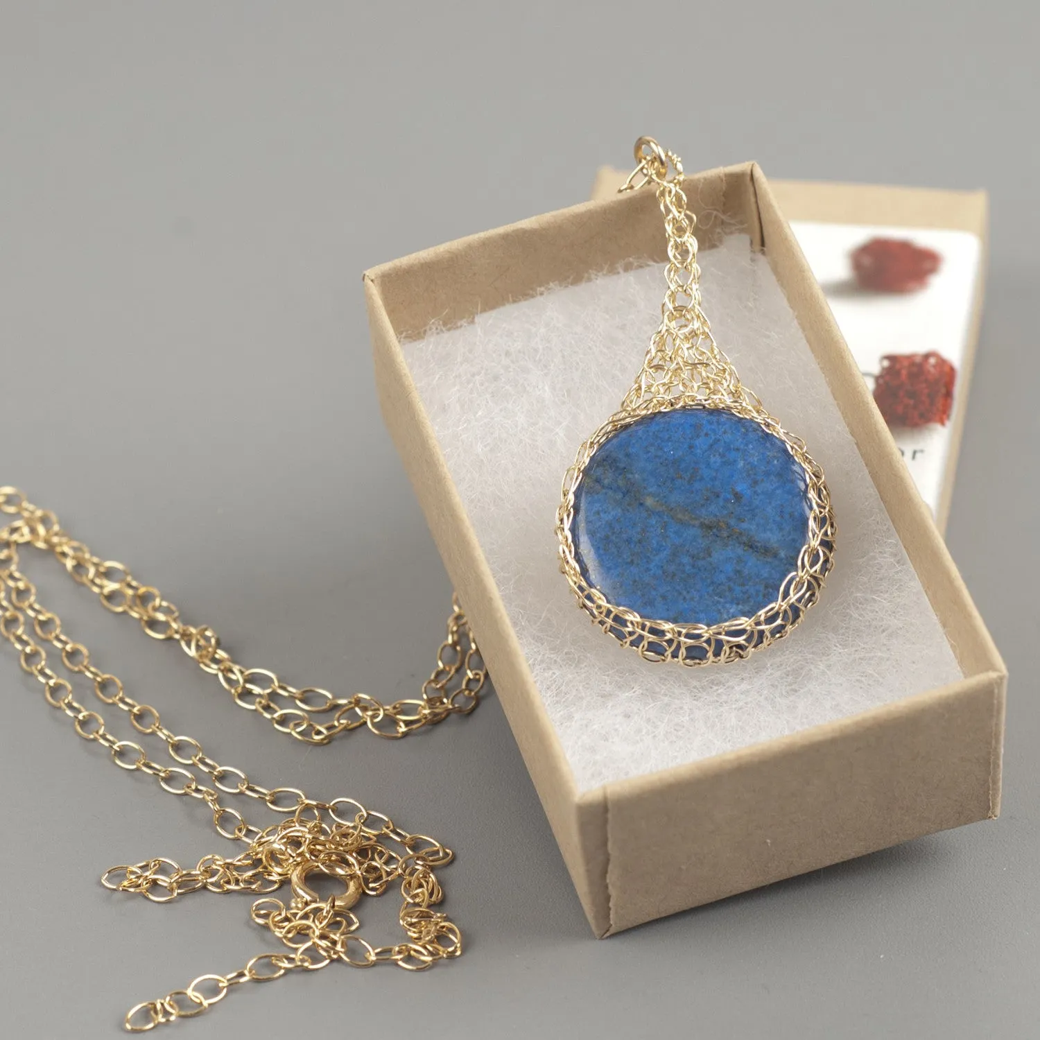 Blue Lapis lazuli pendant necklace wire crocheted in gold wire