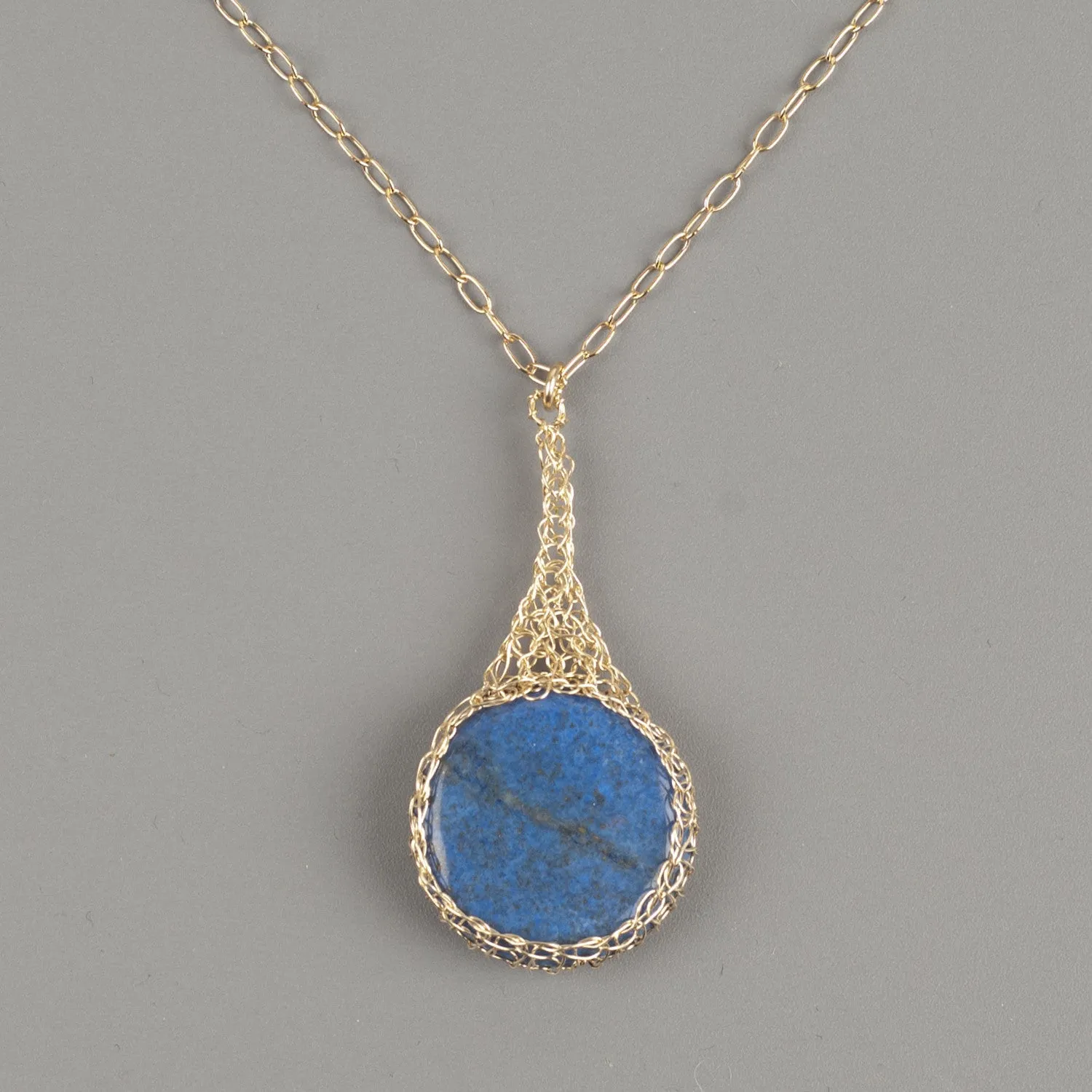 Blue Lapis lazuli pendant necklace wire crocheted in gold wire