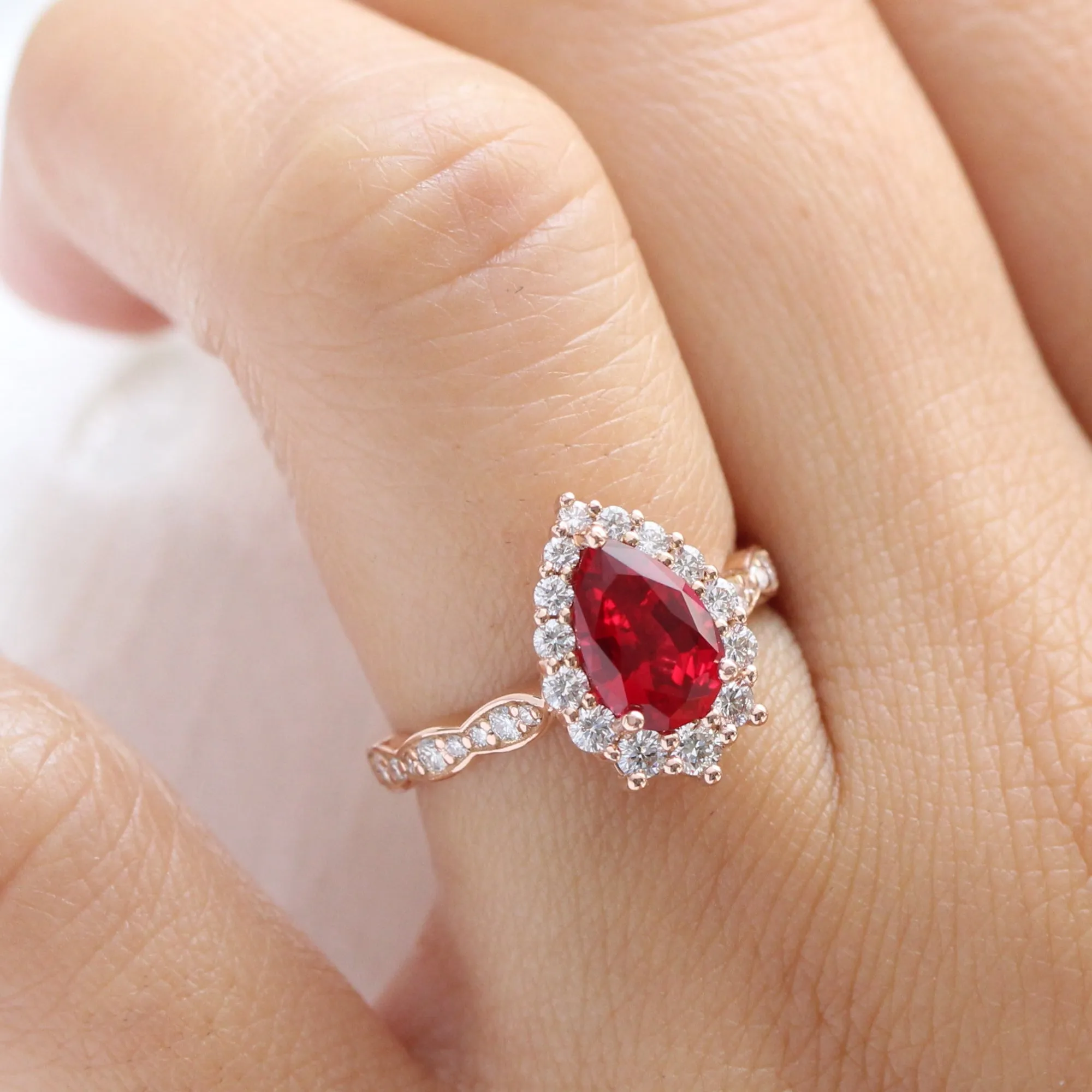 Large Pear Ruby Engagement Ring in Tiara Halo Diamond Scalloped Band