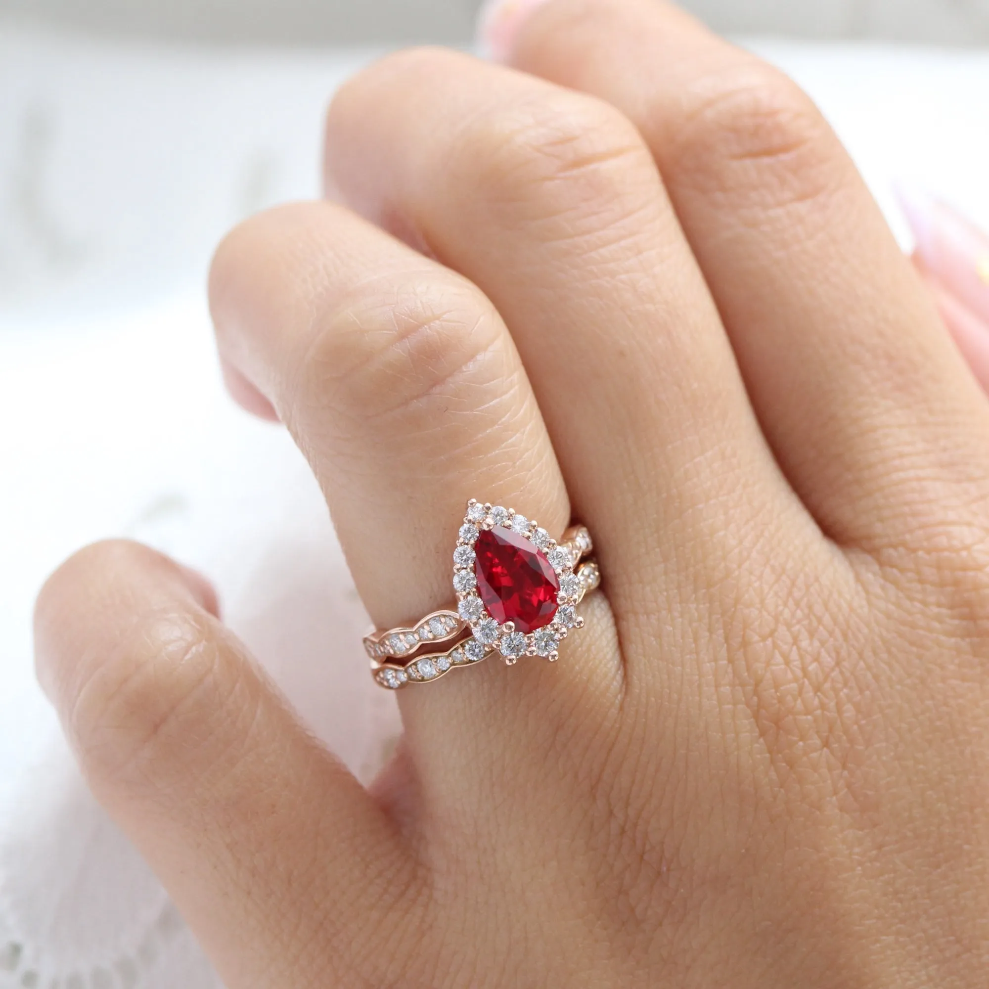 Large Pear Ruby Engagement Ring in Tiara Halo Diamond Scalloped Band