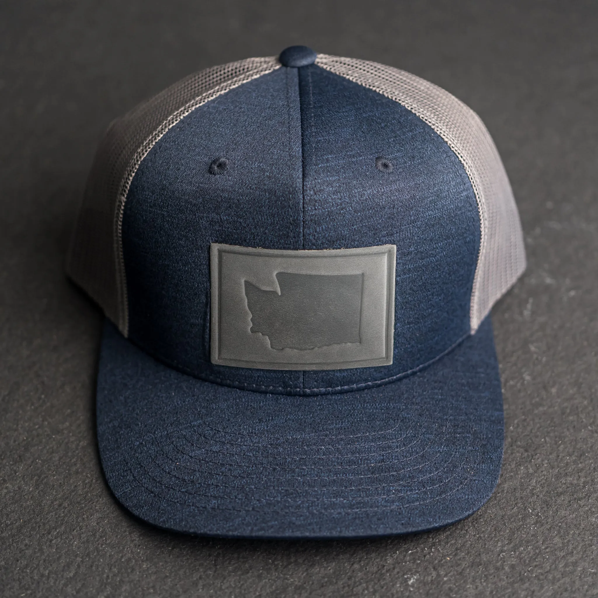 Leather Patch Performance Style Trucker Hat - Washington Stamp