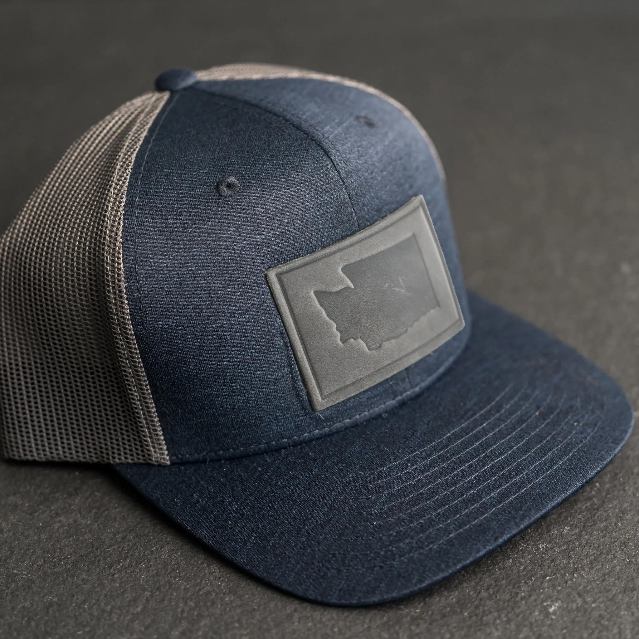 Leather Patch Performance Style Trucker Hat - Washington Stamp