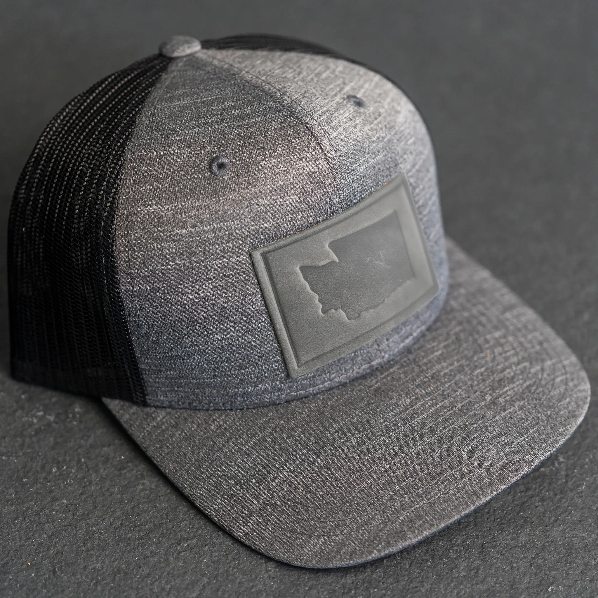 Leather Patch Performance Style Trucker Hat - Washington Stamp