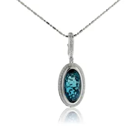 Oval Fancy Cut Blue Topaz & Diamond Halo Pendant