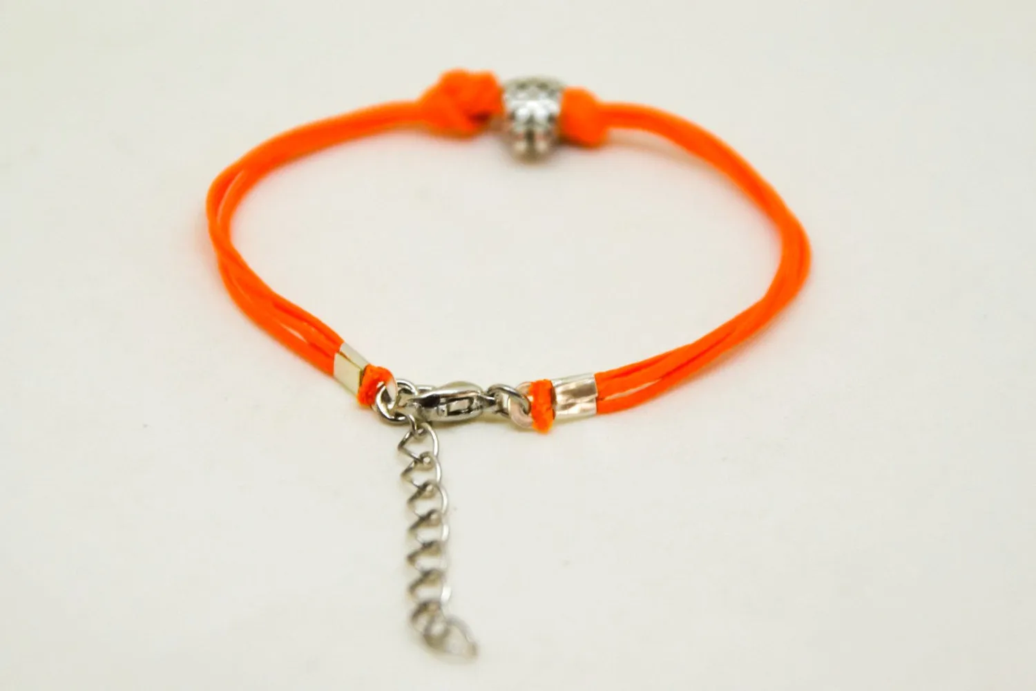 Silver pineapple charm bead bracelet with orange cord, tropical jewelry