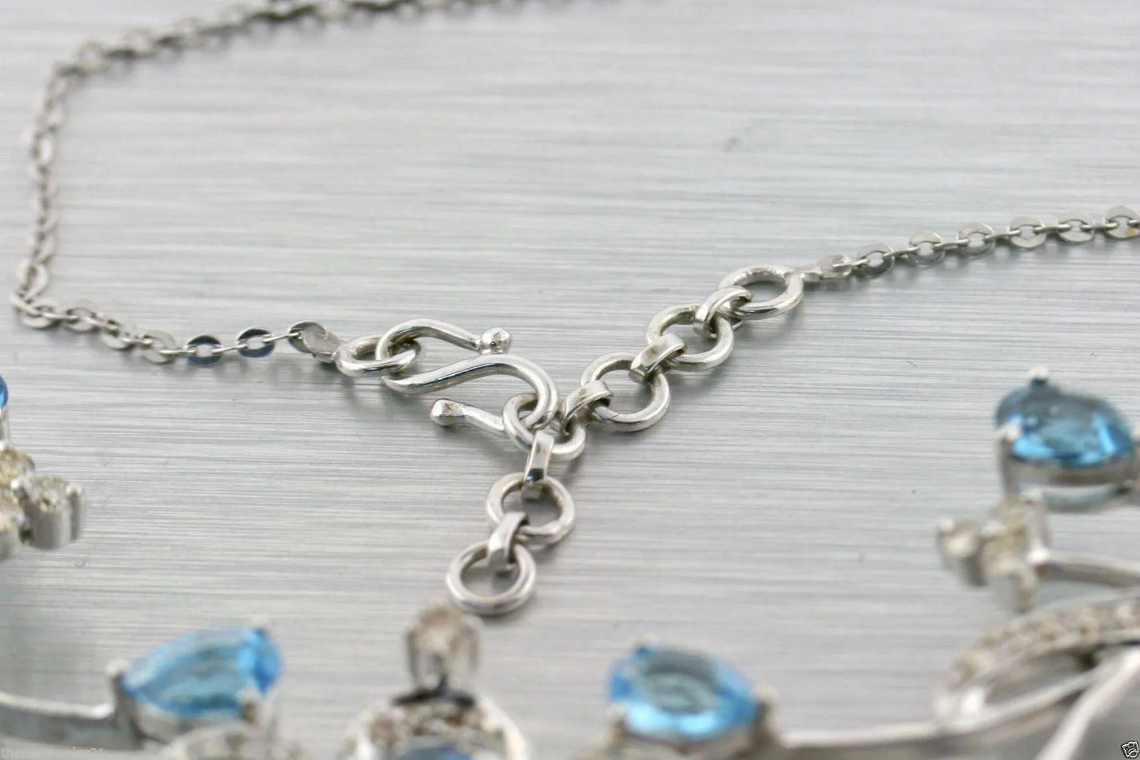 WHITE GOLD BLUE TOPAZ CHAMPAGNE DIAMOND NECKLACE